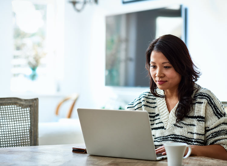 Woman at home getting an insurance quote